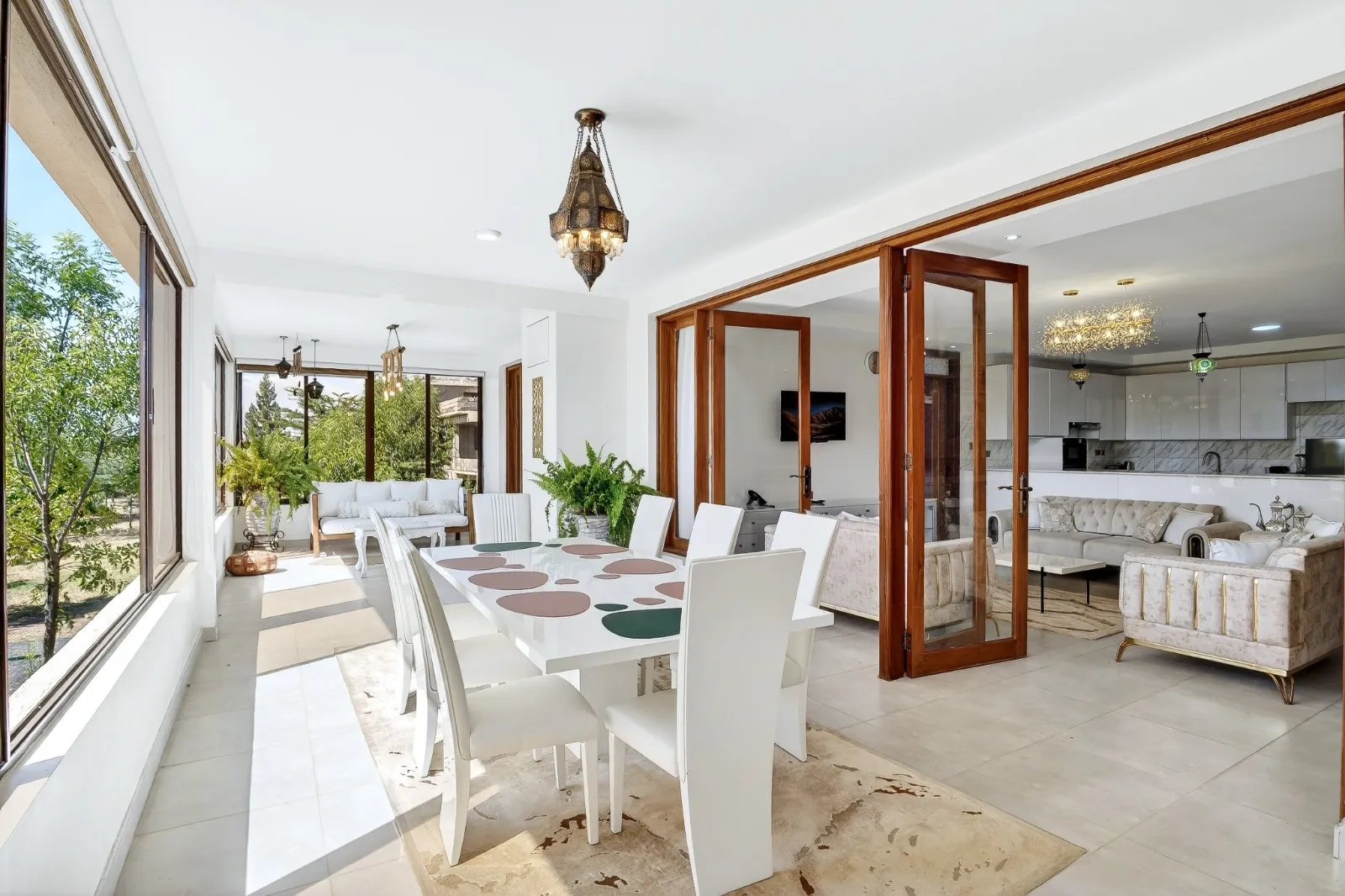 Open-plan living and dining space with wide, level doorways