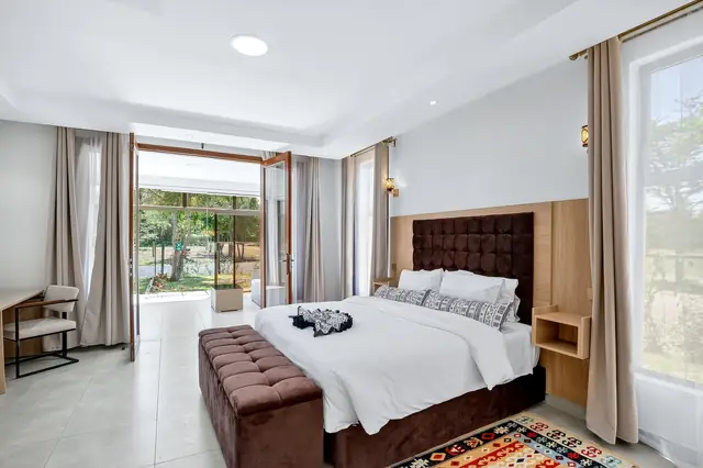 Open living and dining space at OSOTUA Villa 18